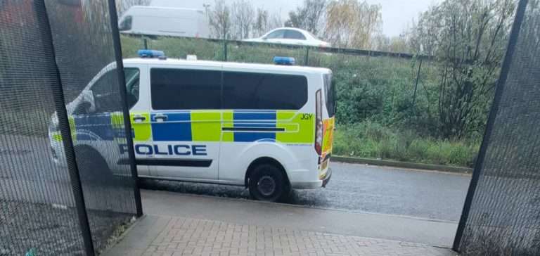 police van outside a police station